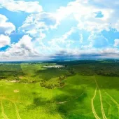 geo-aerial view of colombia fields forest and sky