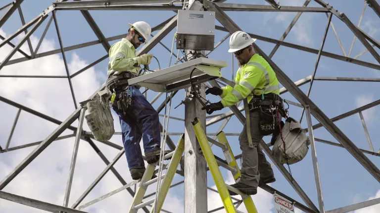 Two lineworkers