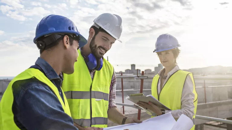 Construction workers conversing