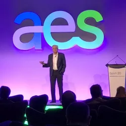 aes leader talking on stage